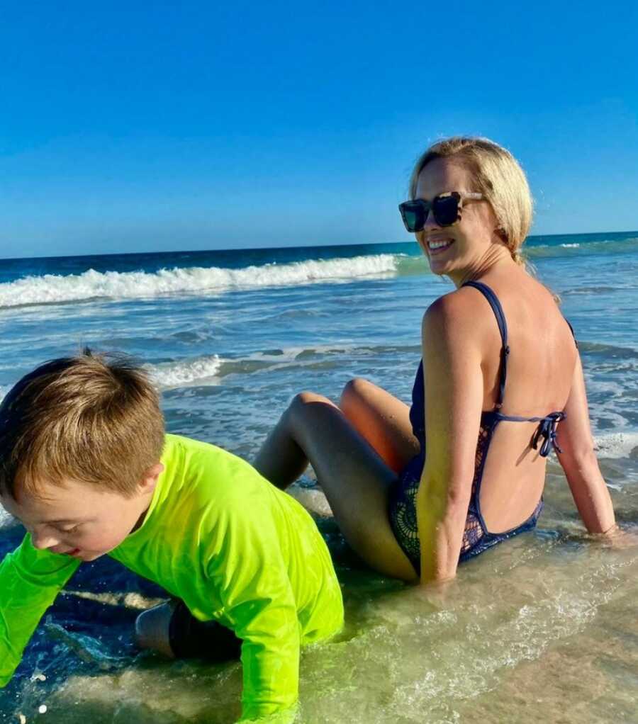 mom and son playing in the water