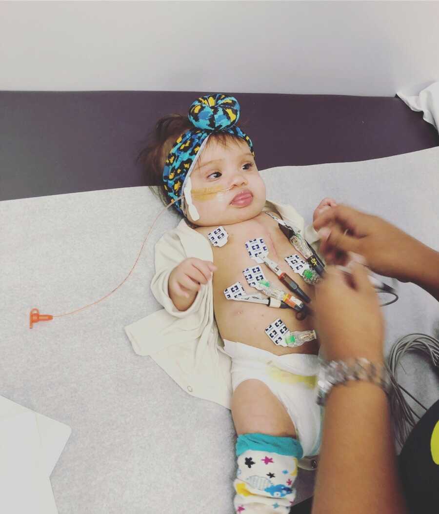 baby girl in the hospital being tested for things