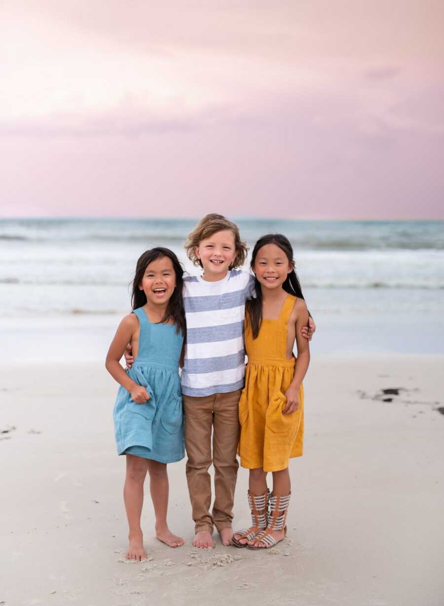 siblings posing for a group photo