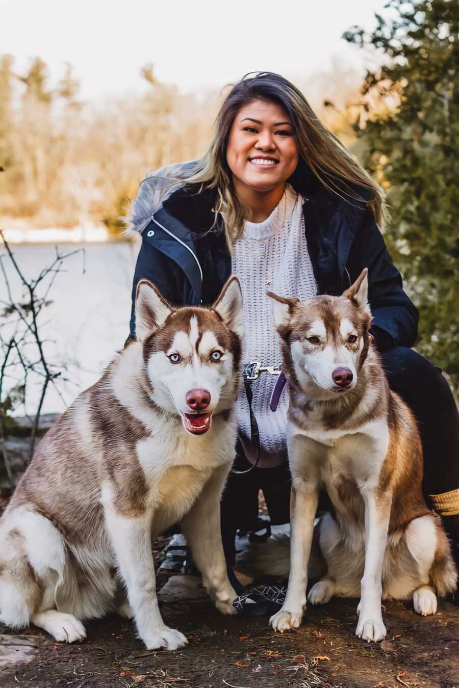 woman with two dogs