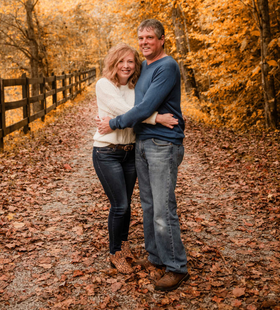 couple embracing outside