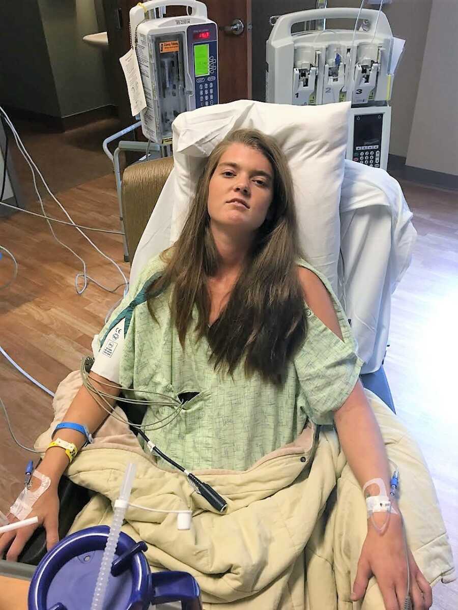 Young woman with chronic pain looks exhausted after an invasive surgery