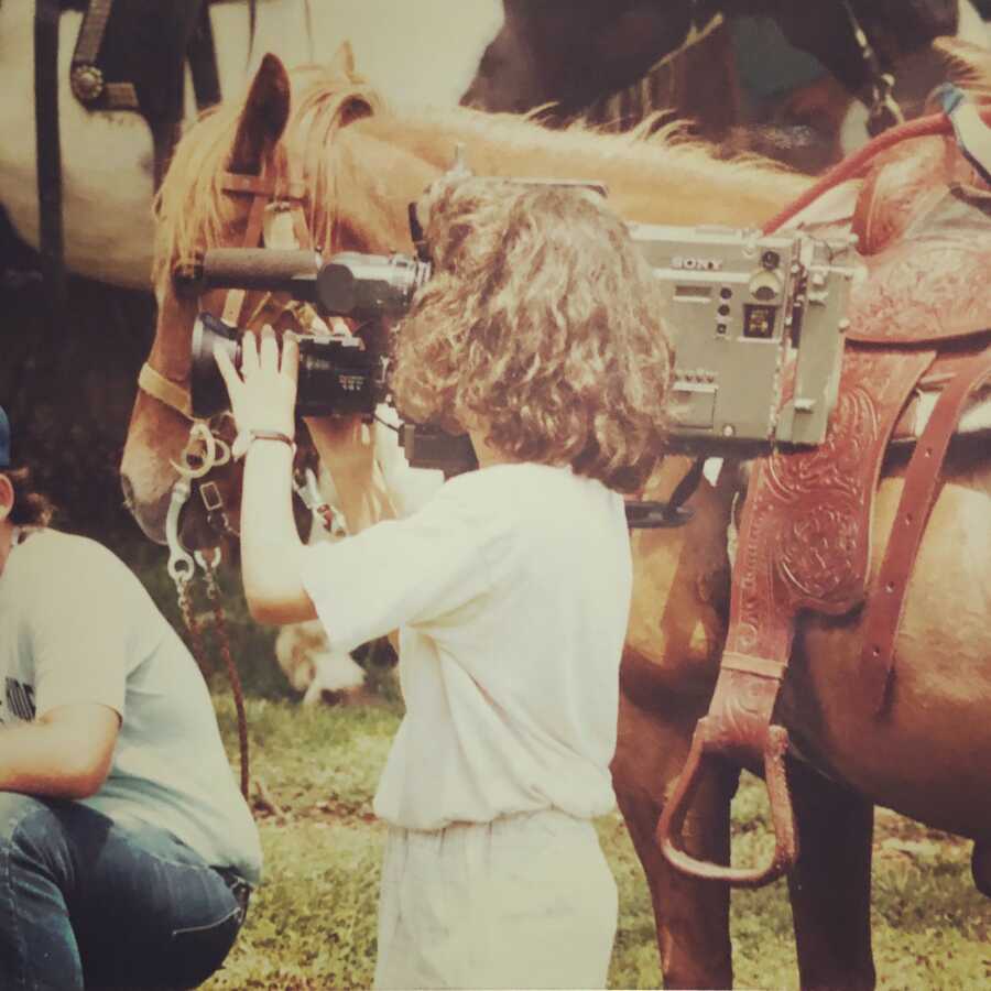 woman filming for her job