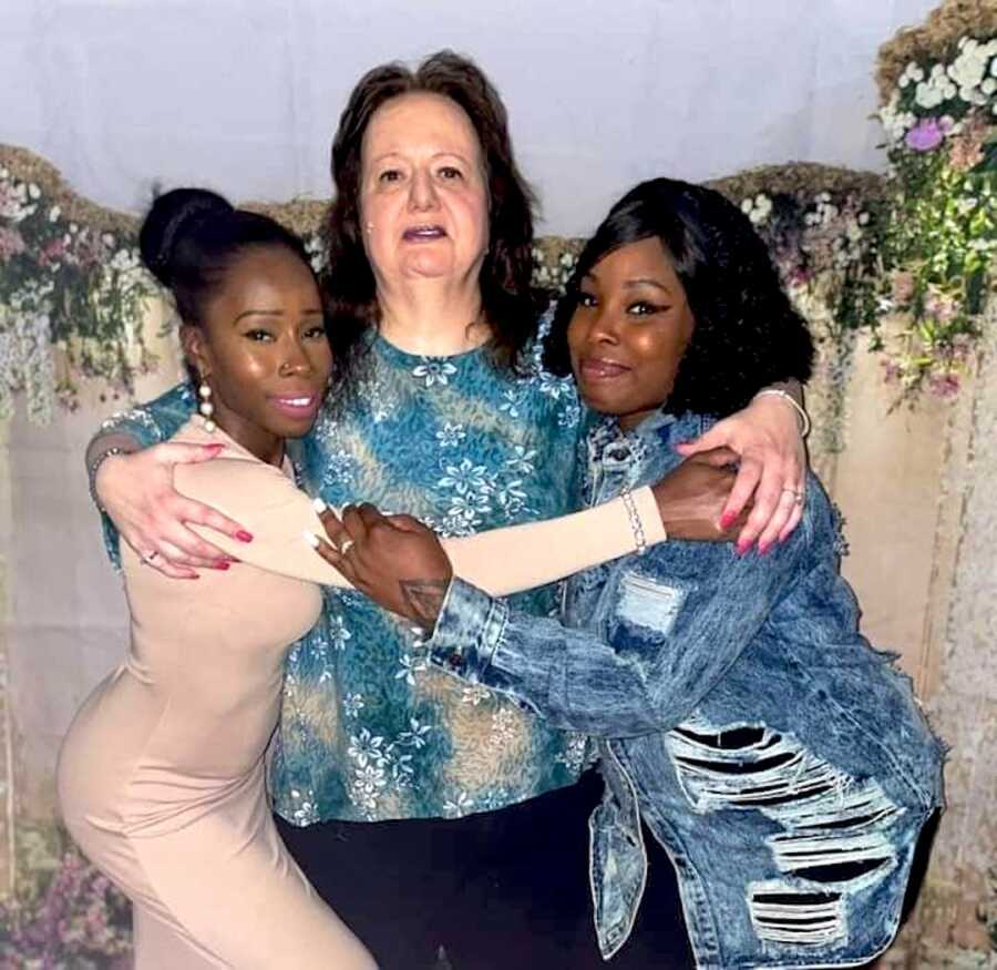 Adoptive mother with her adopted daughter and her sister.