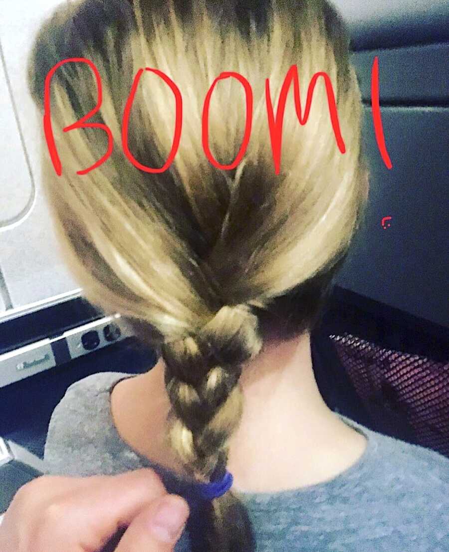 single dad attempts his first braid in his daughters hair on a train ride home
