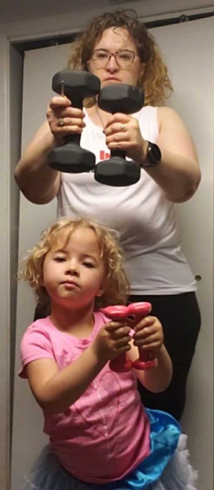 mom and daughter working out
