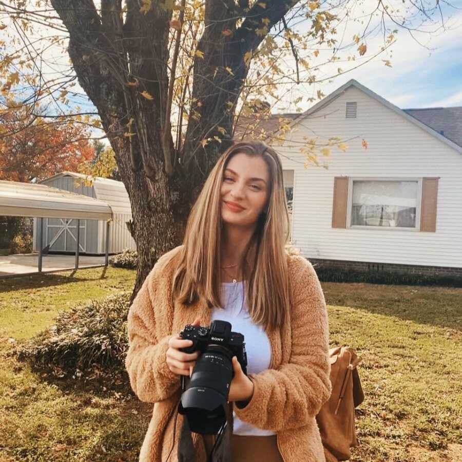 wife with new camera to start business