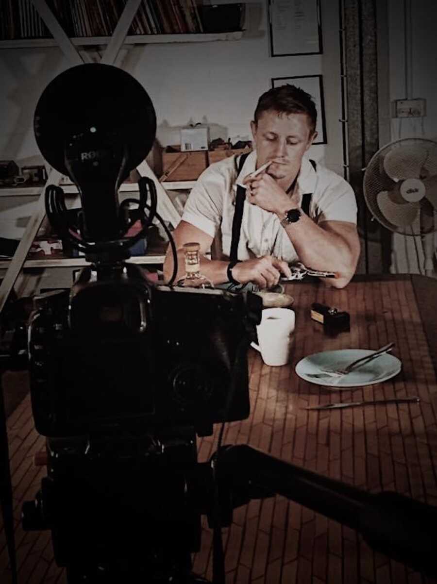 man sitting at a table