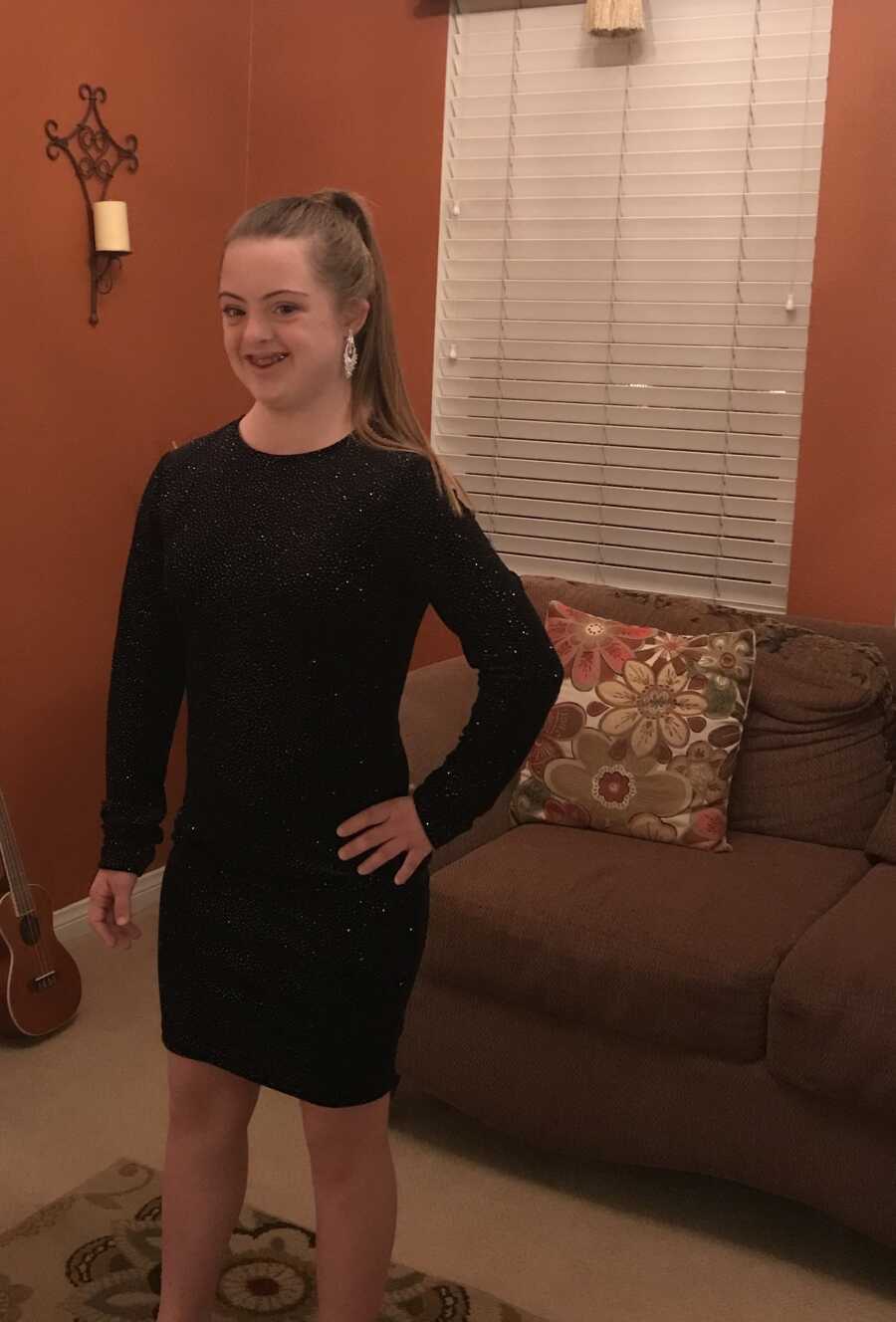 girl with down syndrome in a dress for a dance