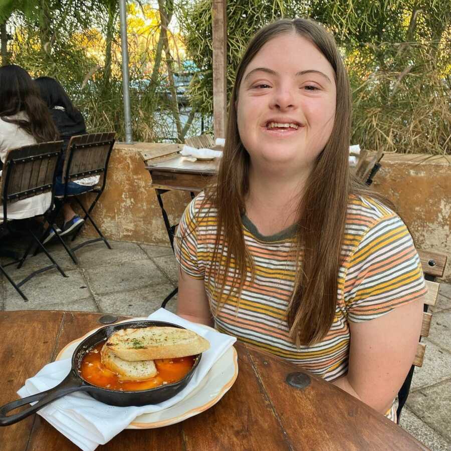 girl with down syndrome tomato soup