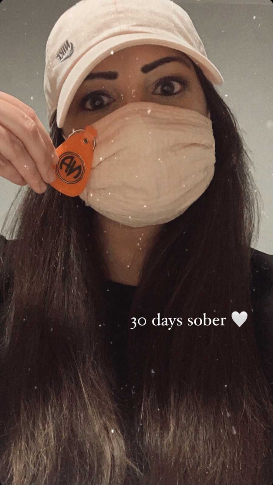 woman 30 days sober wearing a mask