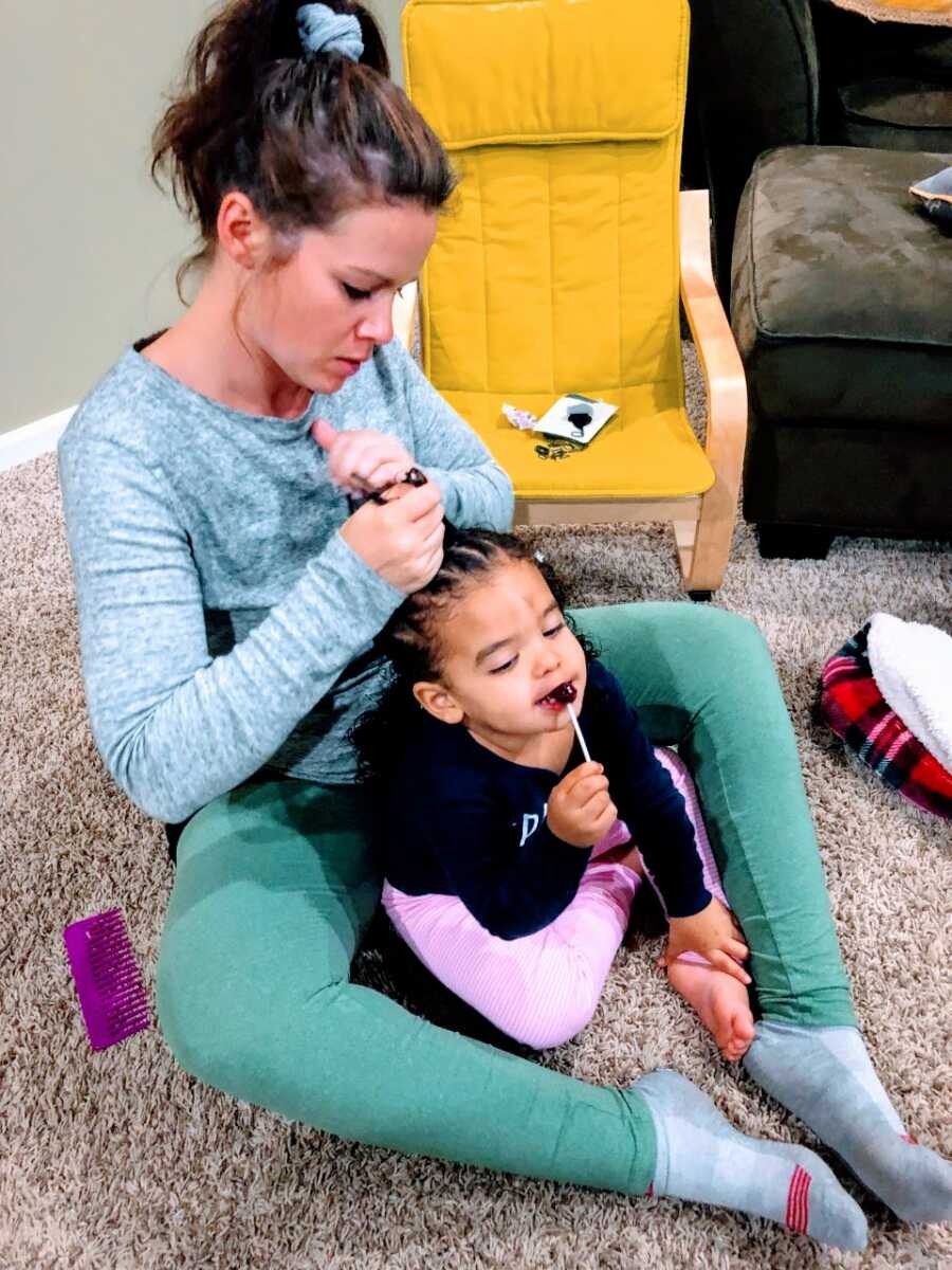 Adoptive mom braids her mixed race adopted daughter's hair