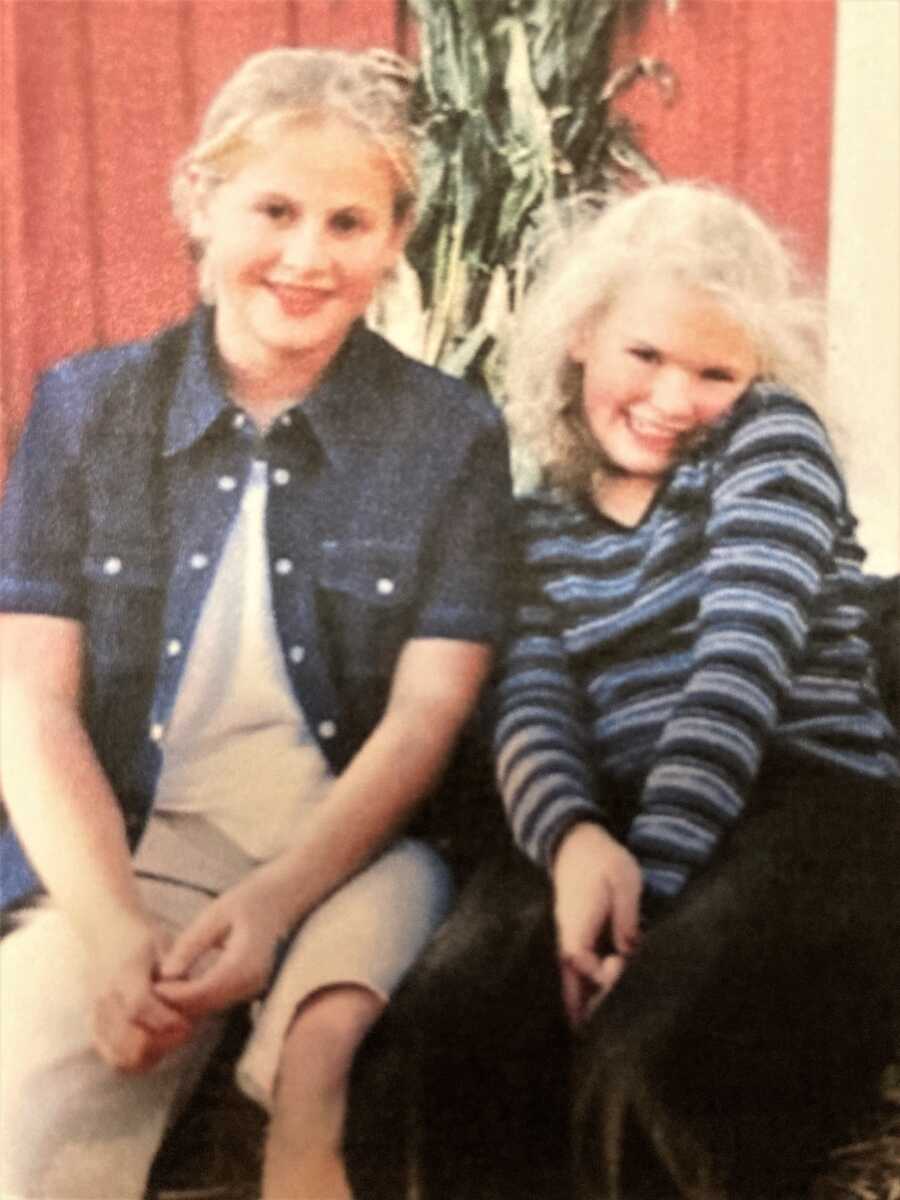 childhood bestfriend wearing striped long-sleeve shirt and denim button-up shirt at a farm