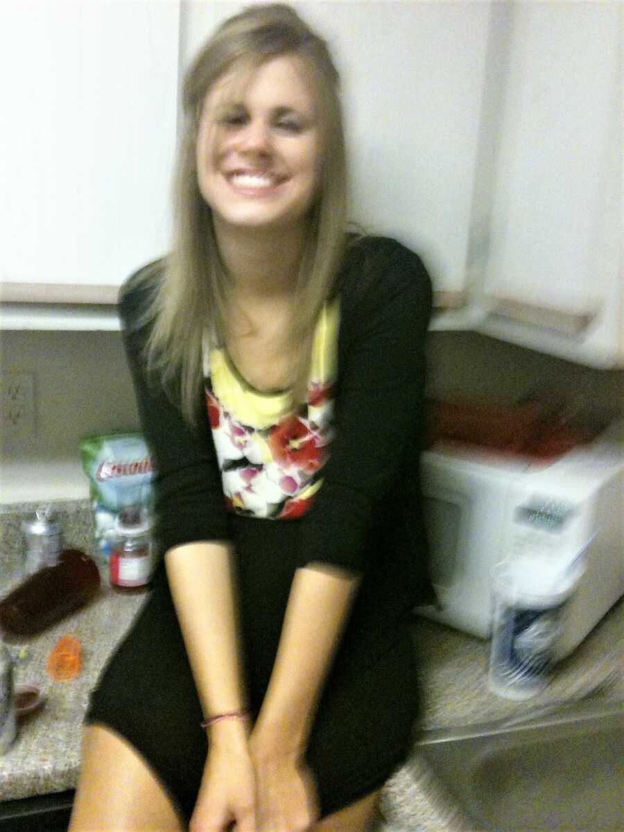 shaky picture of college girl intoxicated with alcohol 
