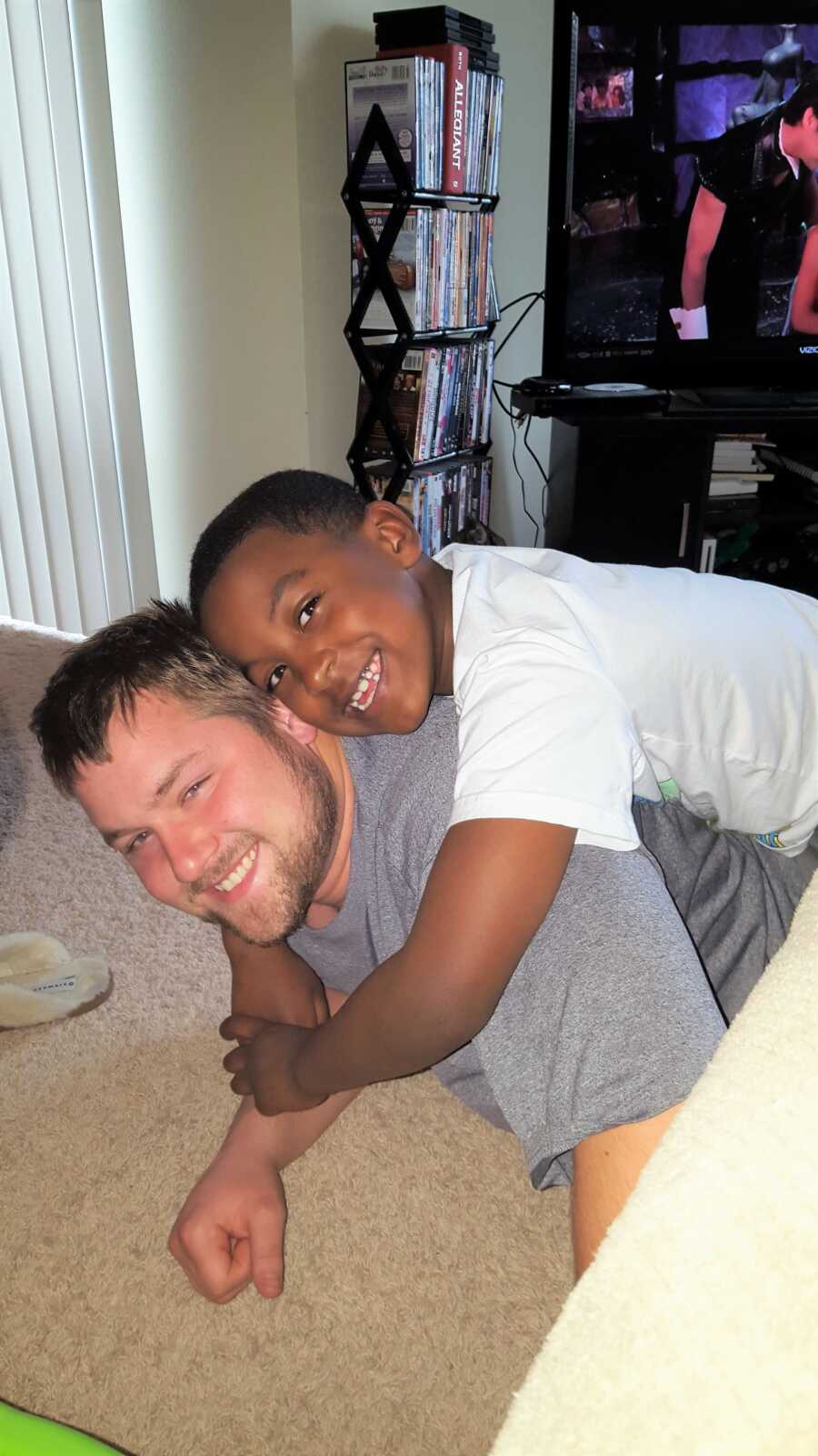 Mom's boyfriend and son wrestle and bond together