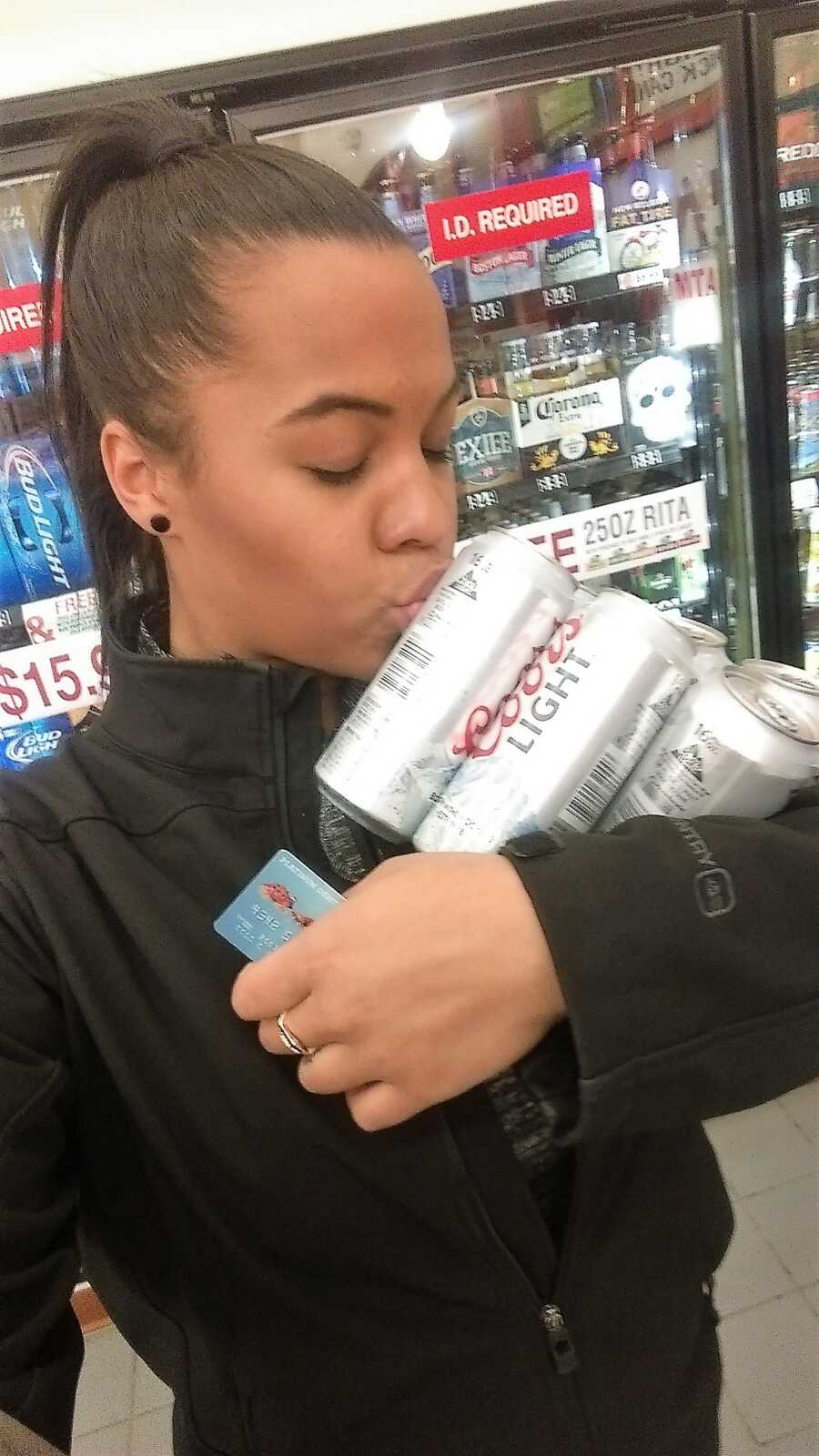 Woman sends a funny picture of her kissing a Coors Light to her crush
