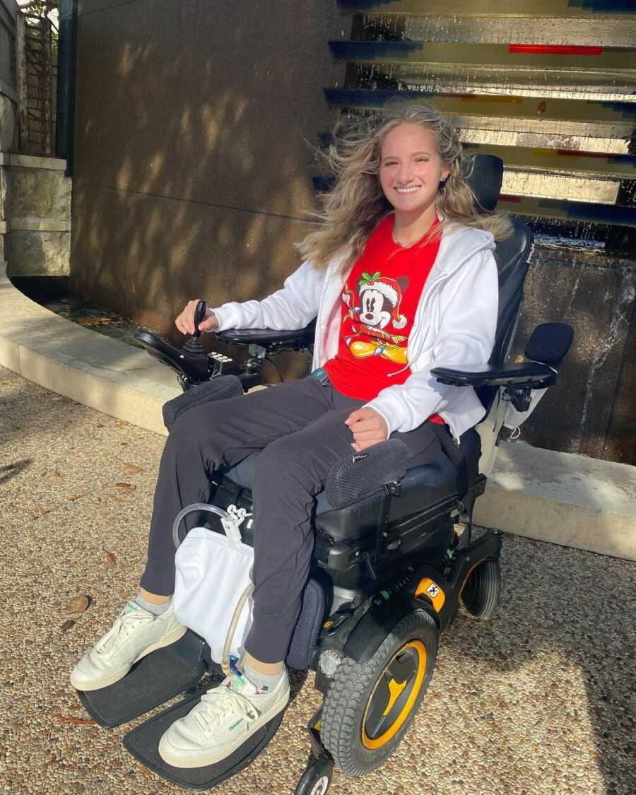 cheerleader in a motor wheelchair