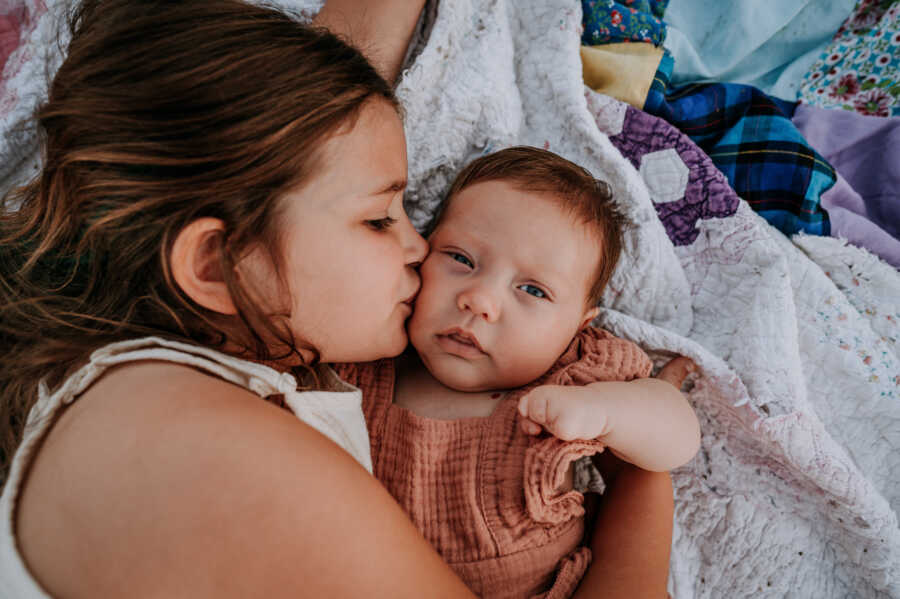 mom holding her baby