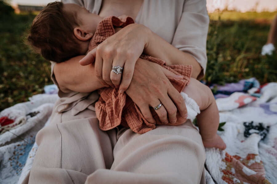 mom holding her baby