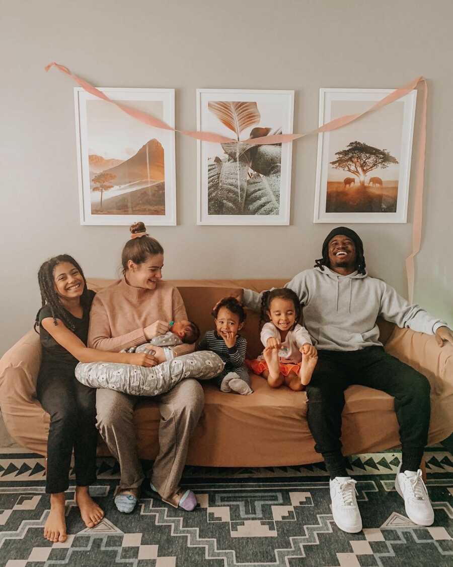 family of five all together on a couch