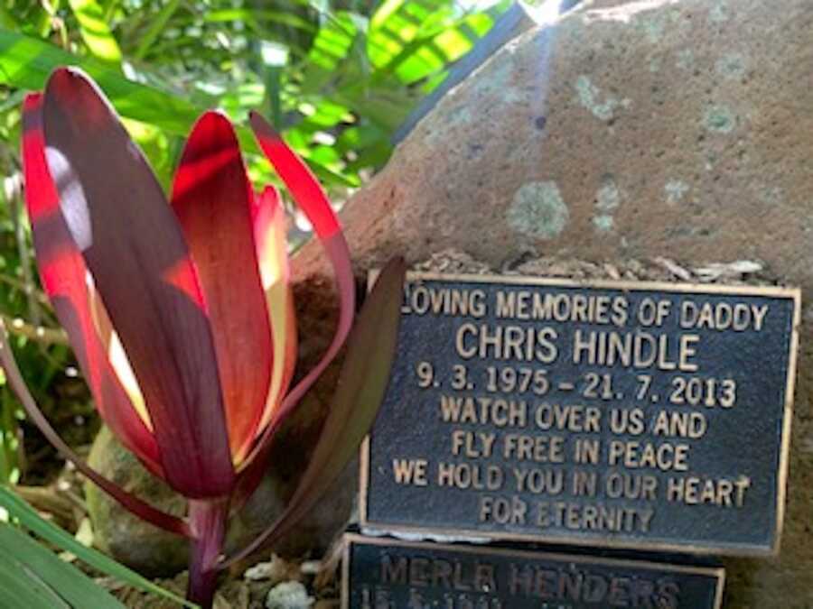 grave with a flower