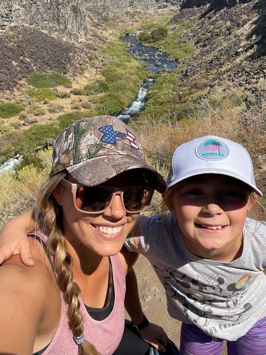 woman taking a selfie with her child