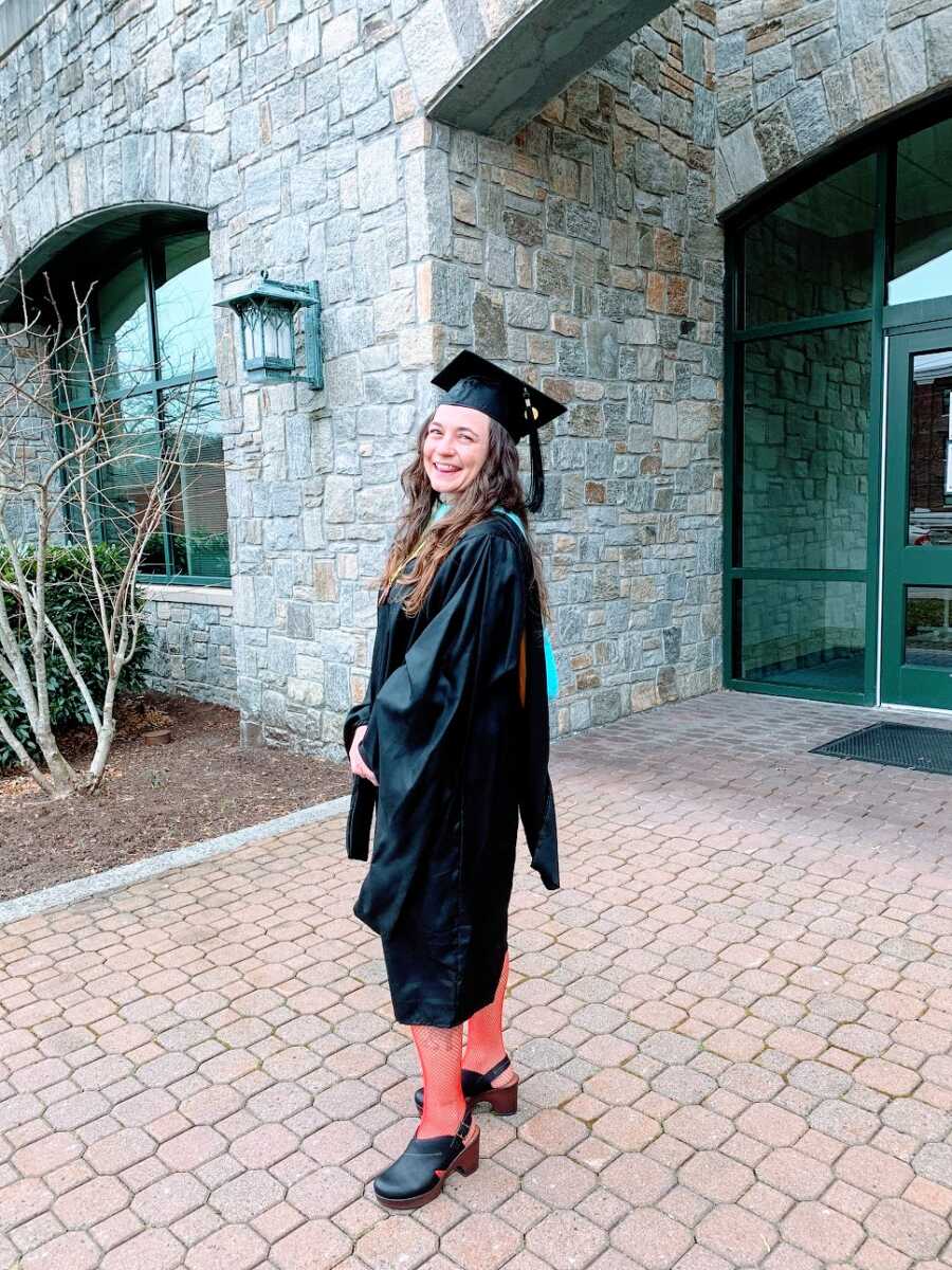 A former addict in a cap in gown at her graduation