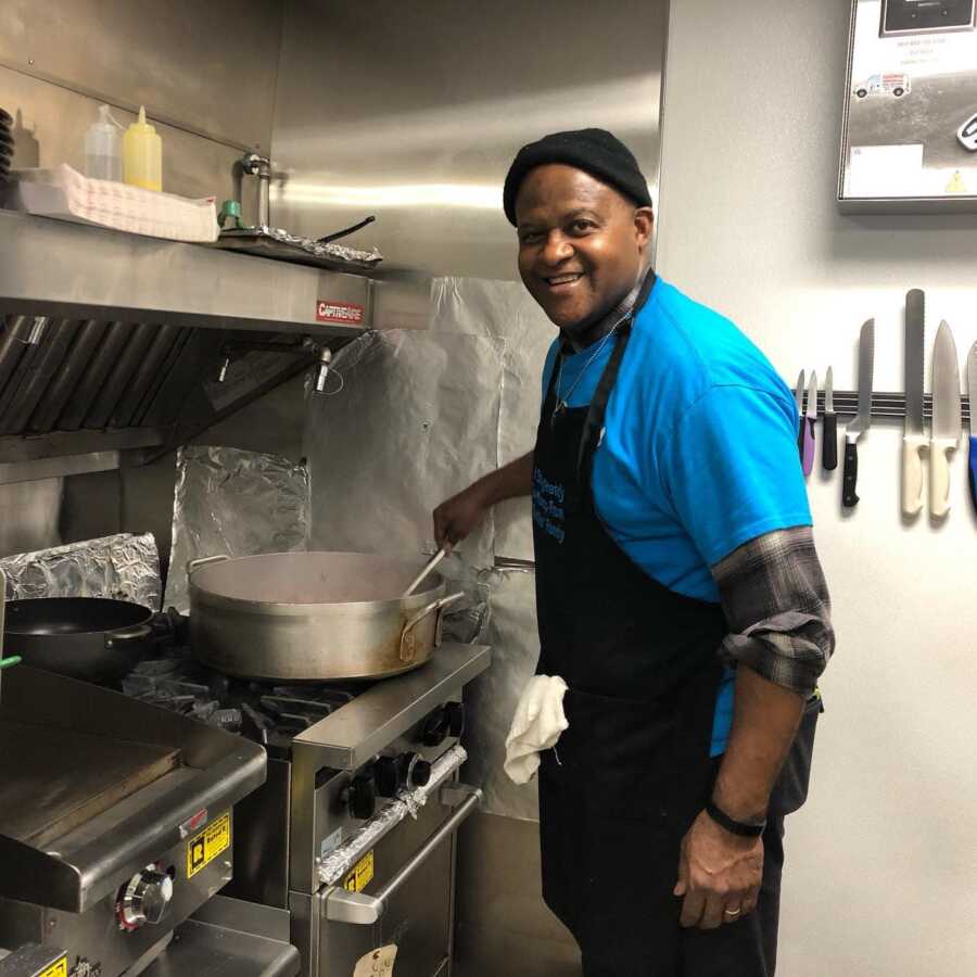 Michael Brown cooks in his non-profit restaurant, Fresh Soul. 