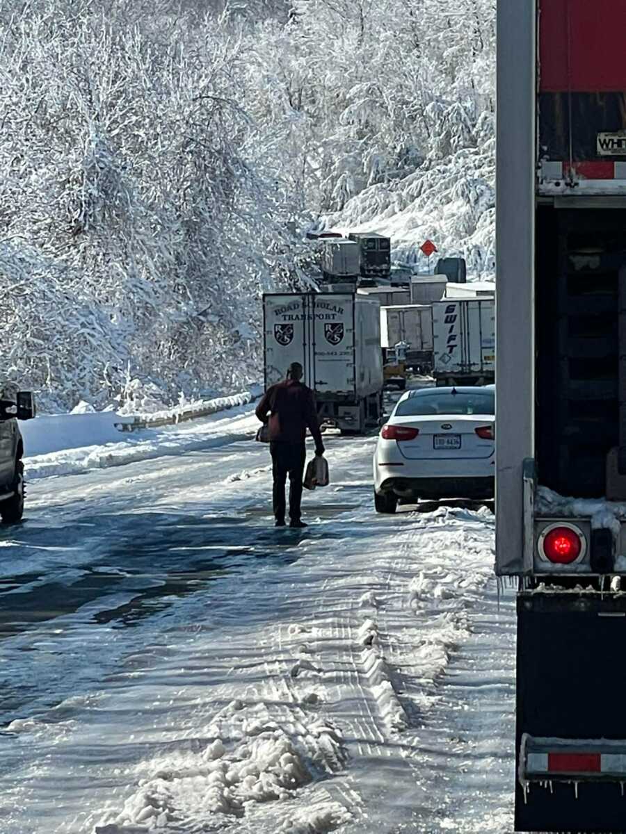 Ron Hill distributes bread to stranded motorists on I-95 in Virginia.