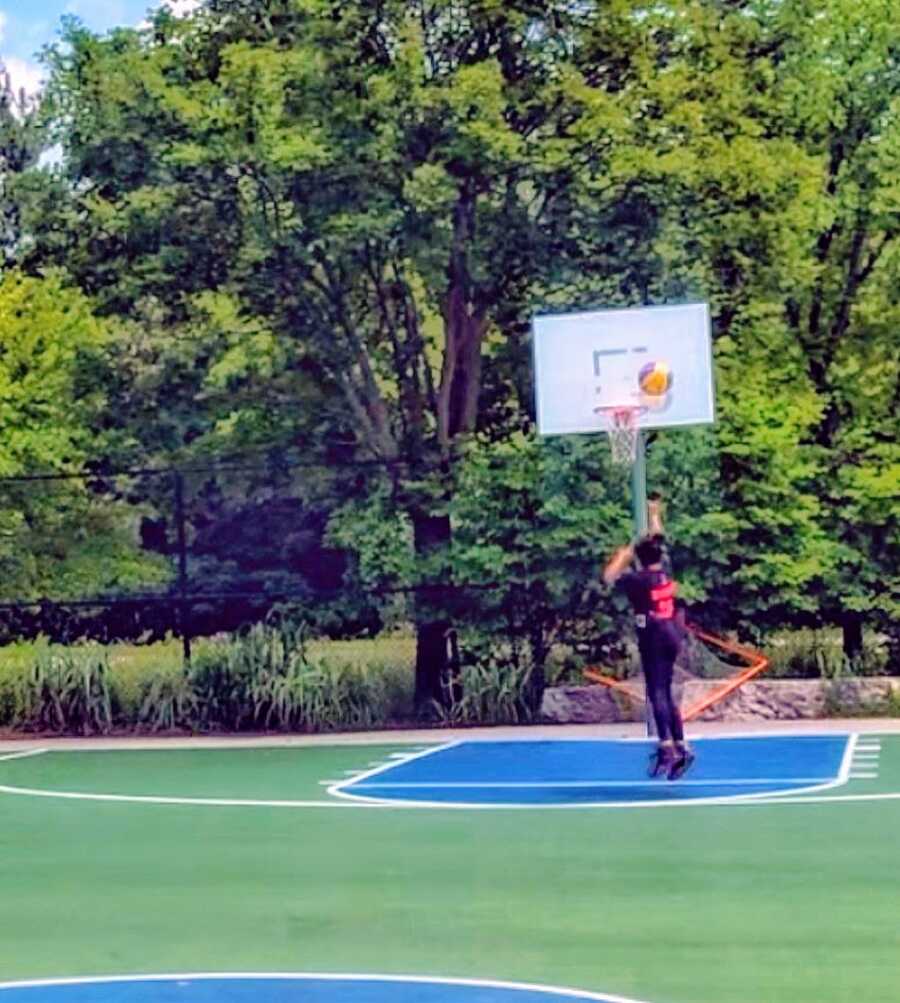 A woman with a rare condition playing basketball