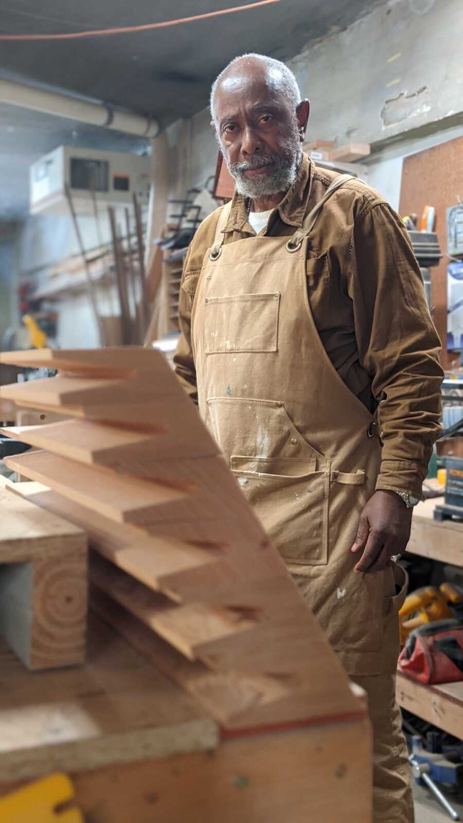 formerly incarcerated employee woodworking on Formr furniture