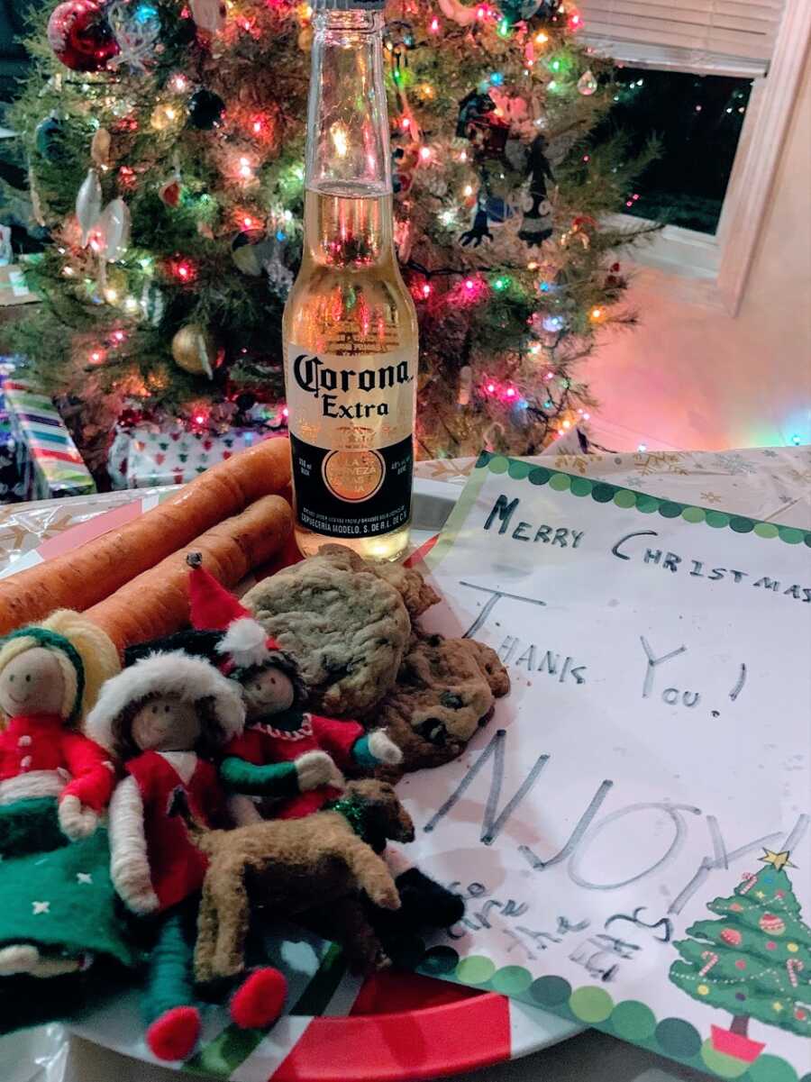 Beer, carrots, cookies, and a note left for Santa
