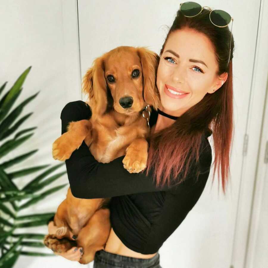 Meg and her pet dog, who she normally adores. 