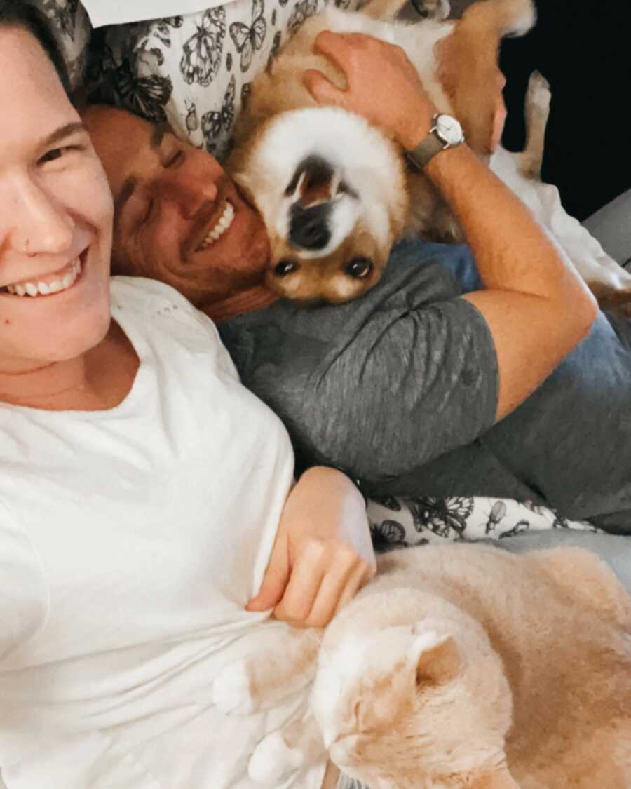 woman with her dog and her boyfriend