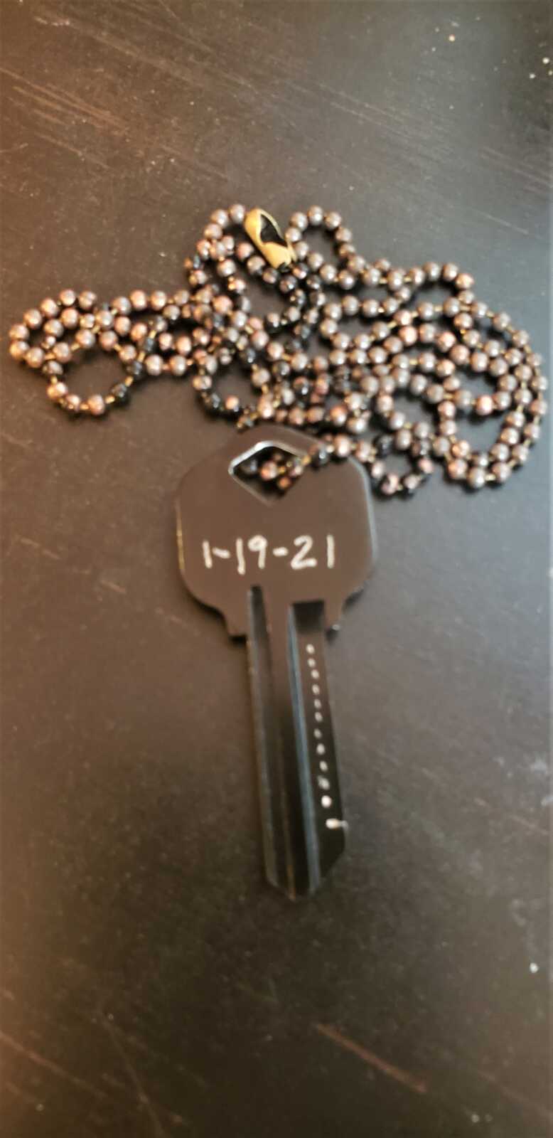 key of hope with sobriety date on it