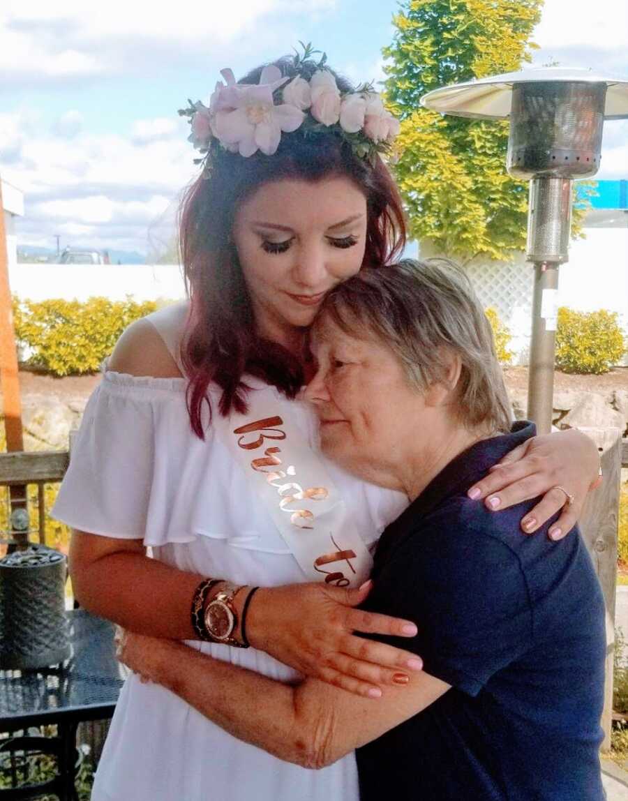 A bride-to-be hugs her mom with dementia
