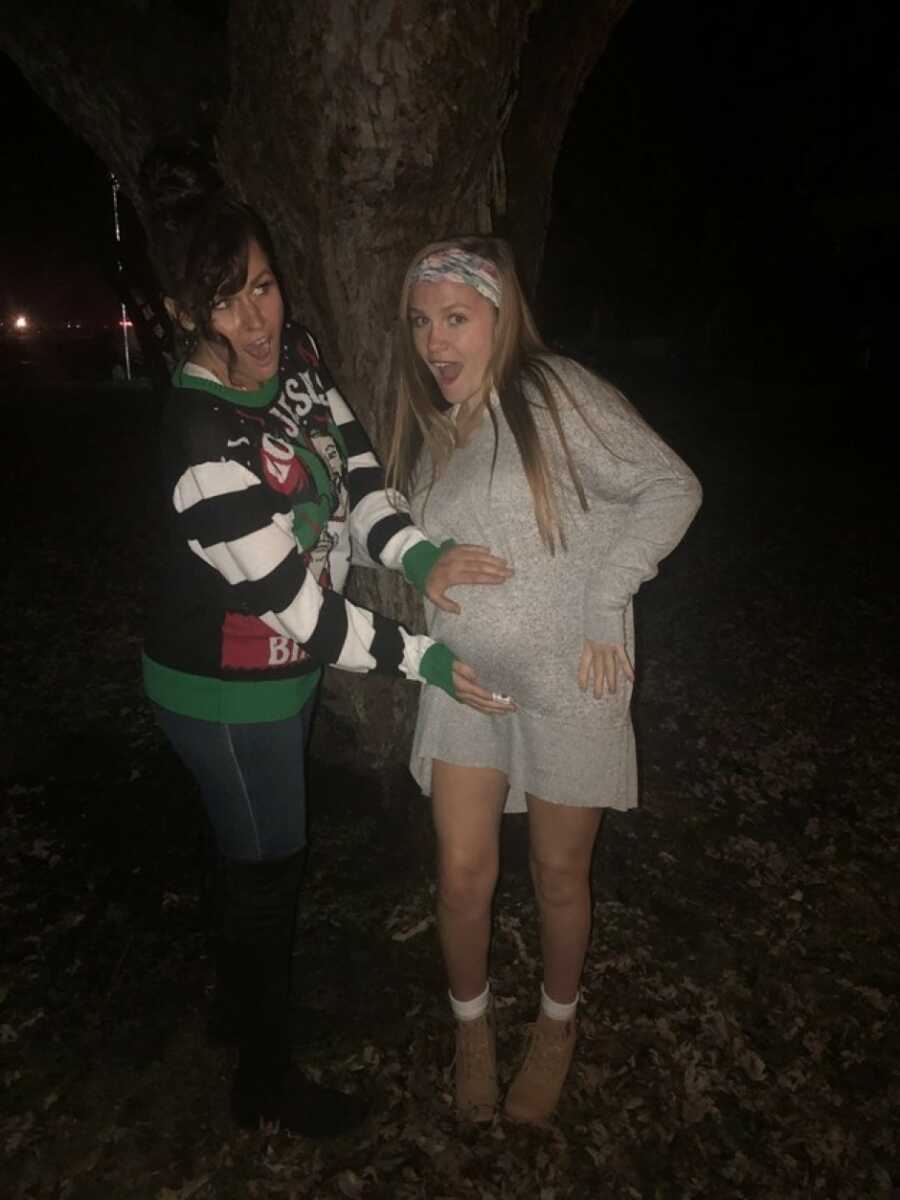 teen mom posing with her pregnant belly