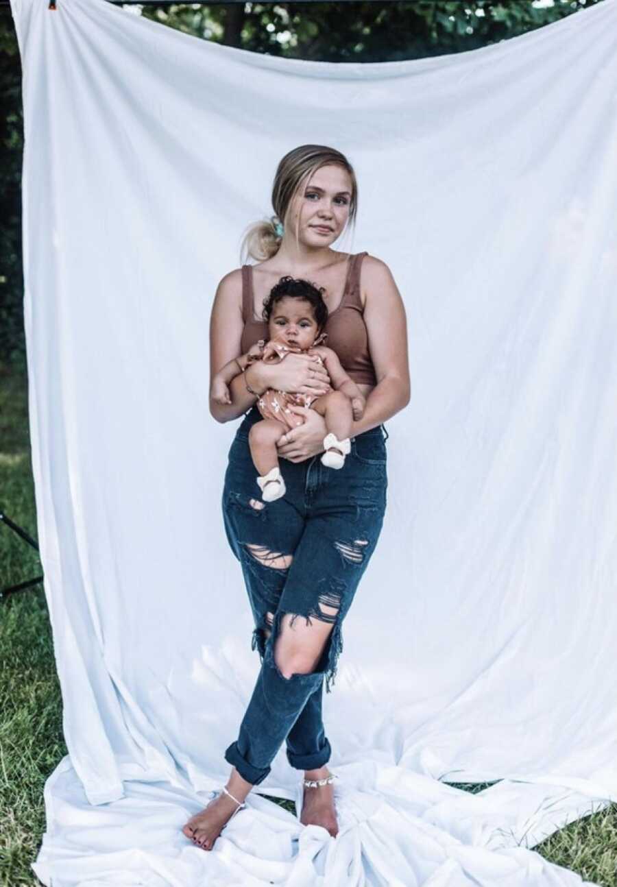 teen mom with her new born daughter