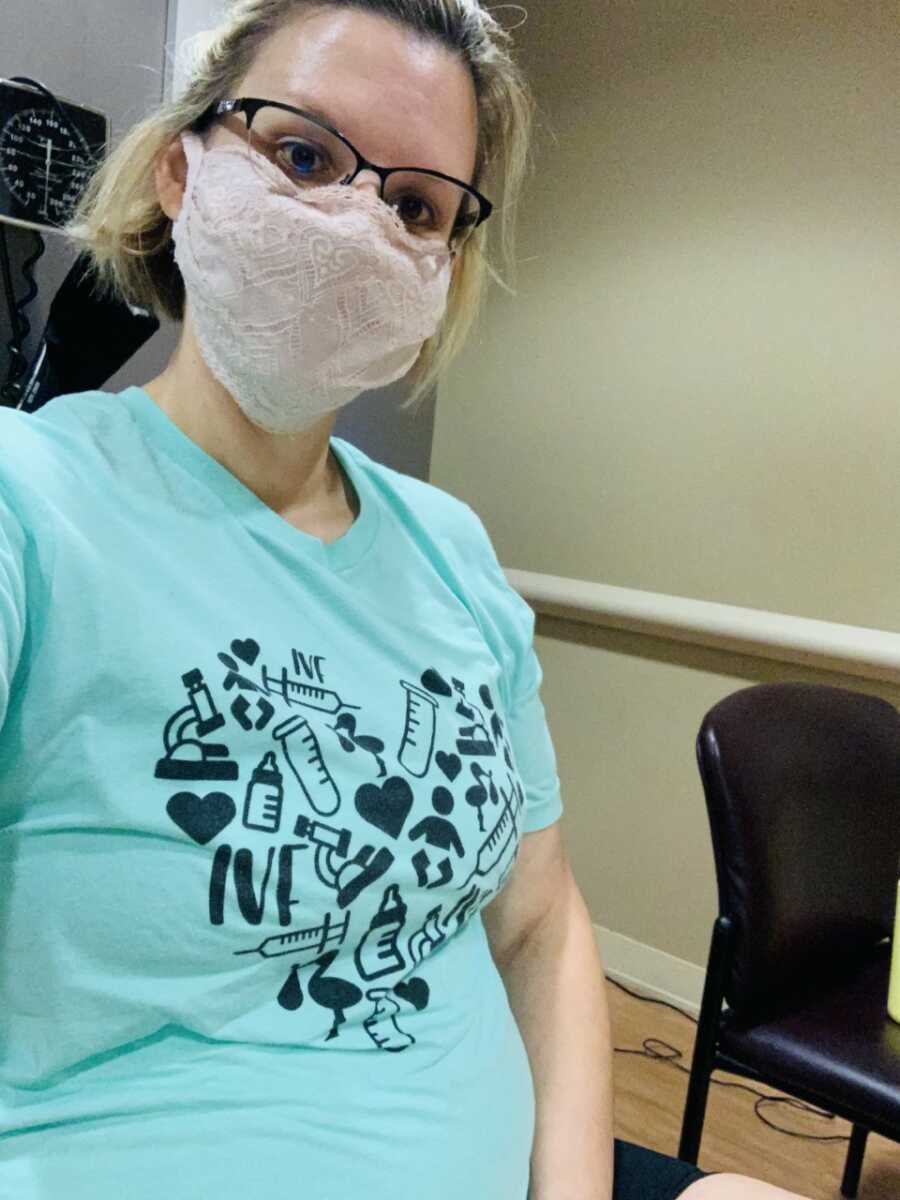 surrogate mom wearing a mask at the doctor's office 