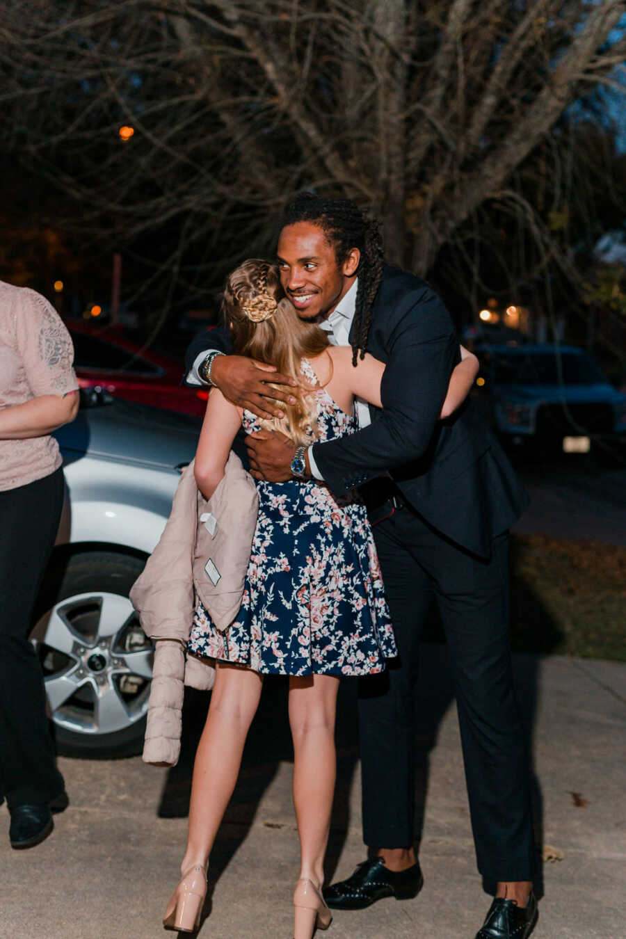 girl meeting her date to the dance