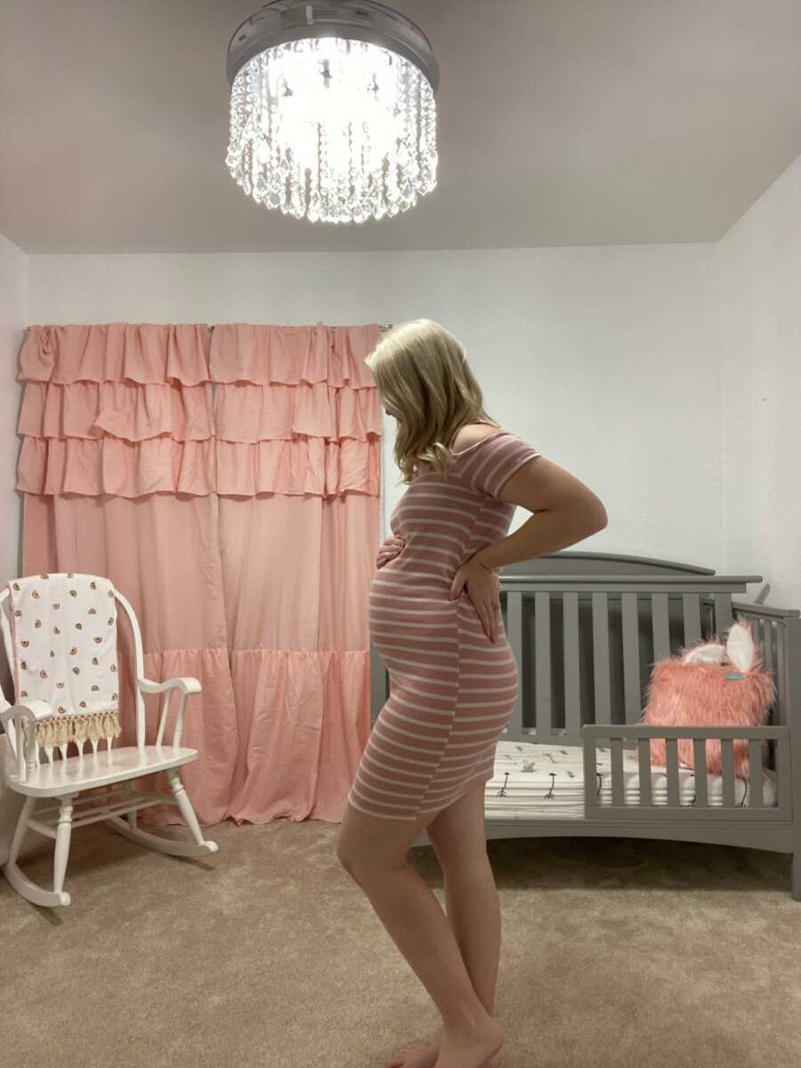 woman showing off her baby bump