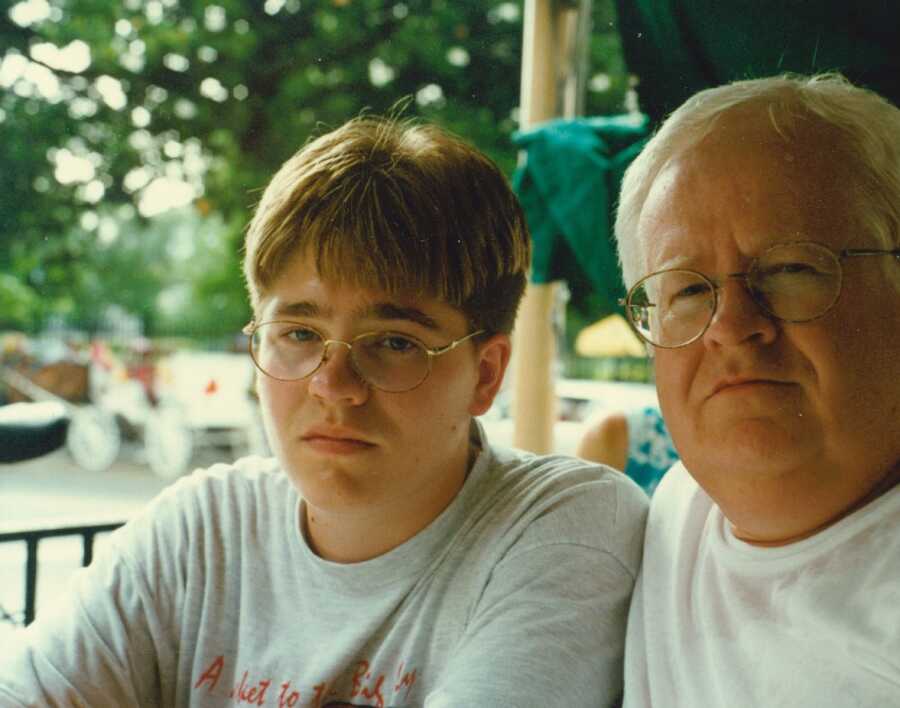 man with his father while he is in pain