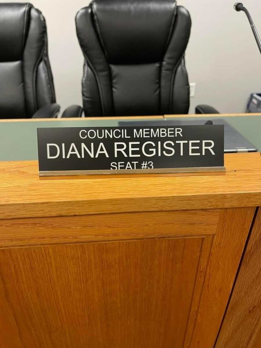 woman's name plaque in office