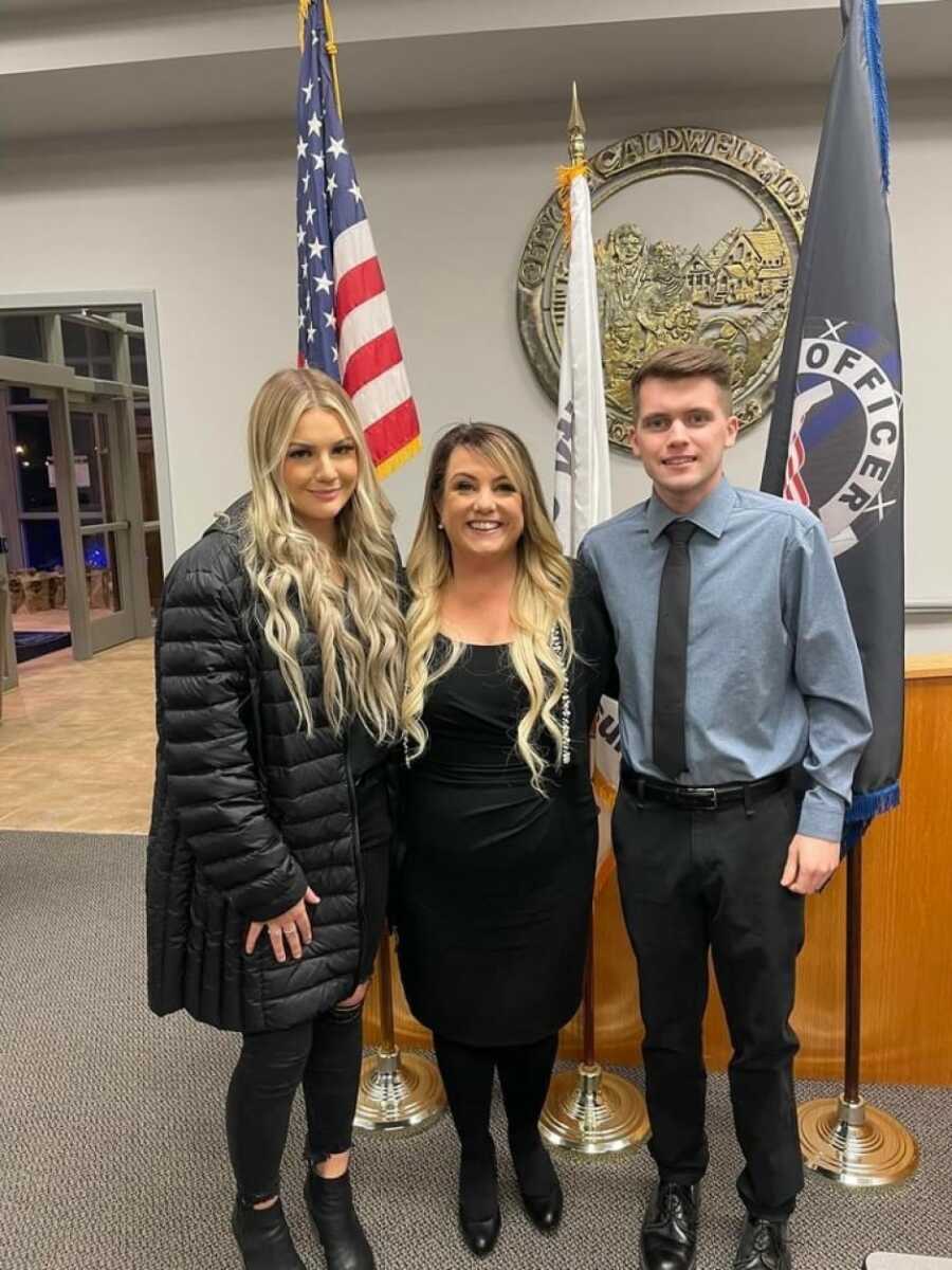 woman with her kids after she had been sworn in