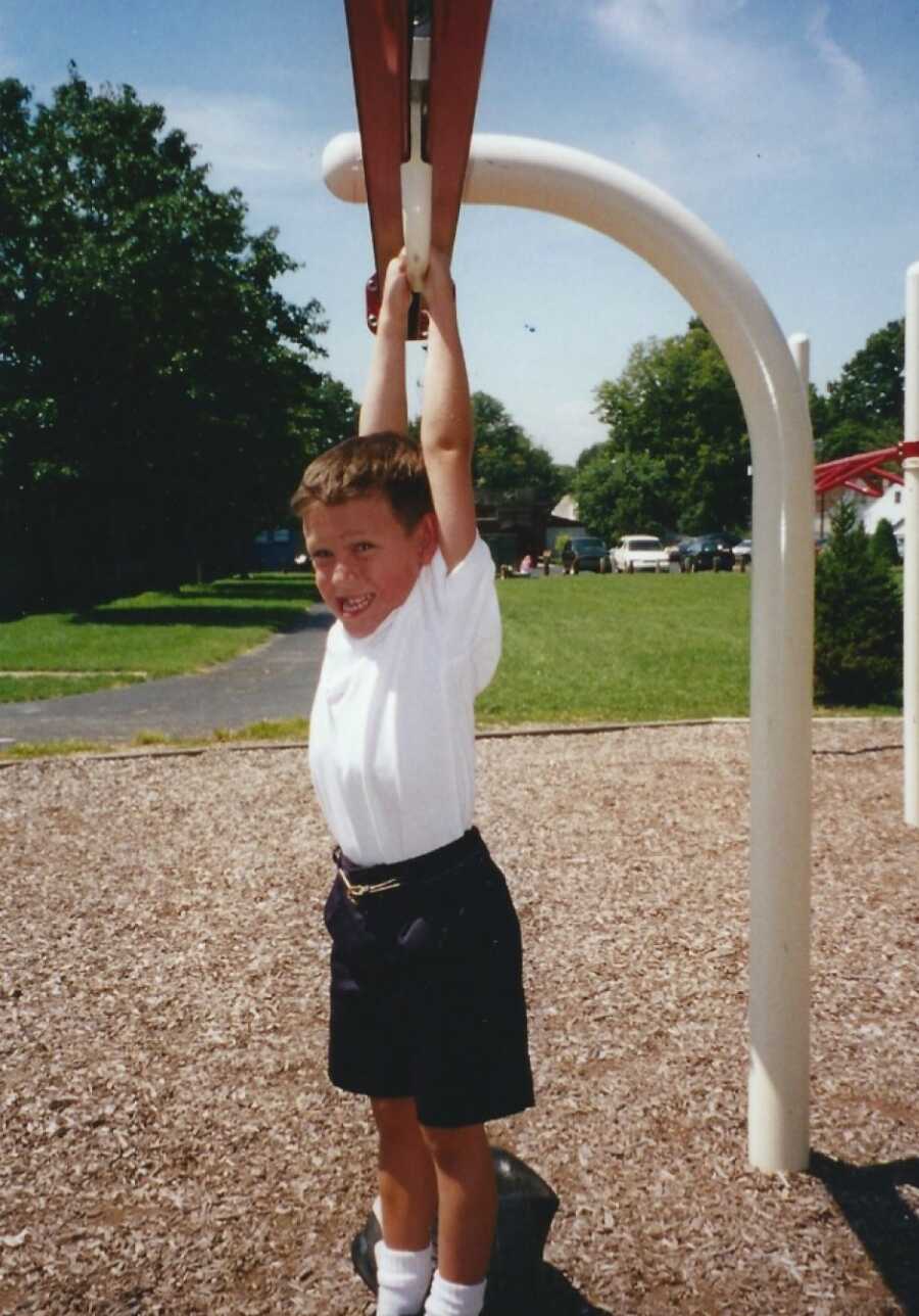 little boy playing in the park