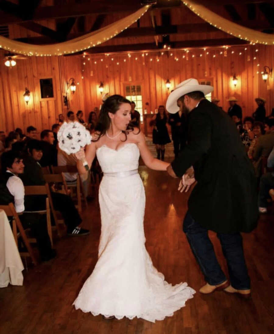 woman and her new husband taking a picture dancing