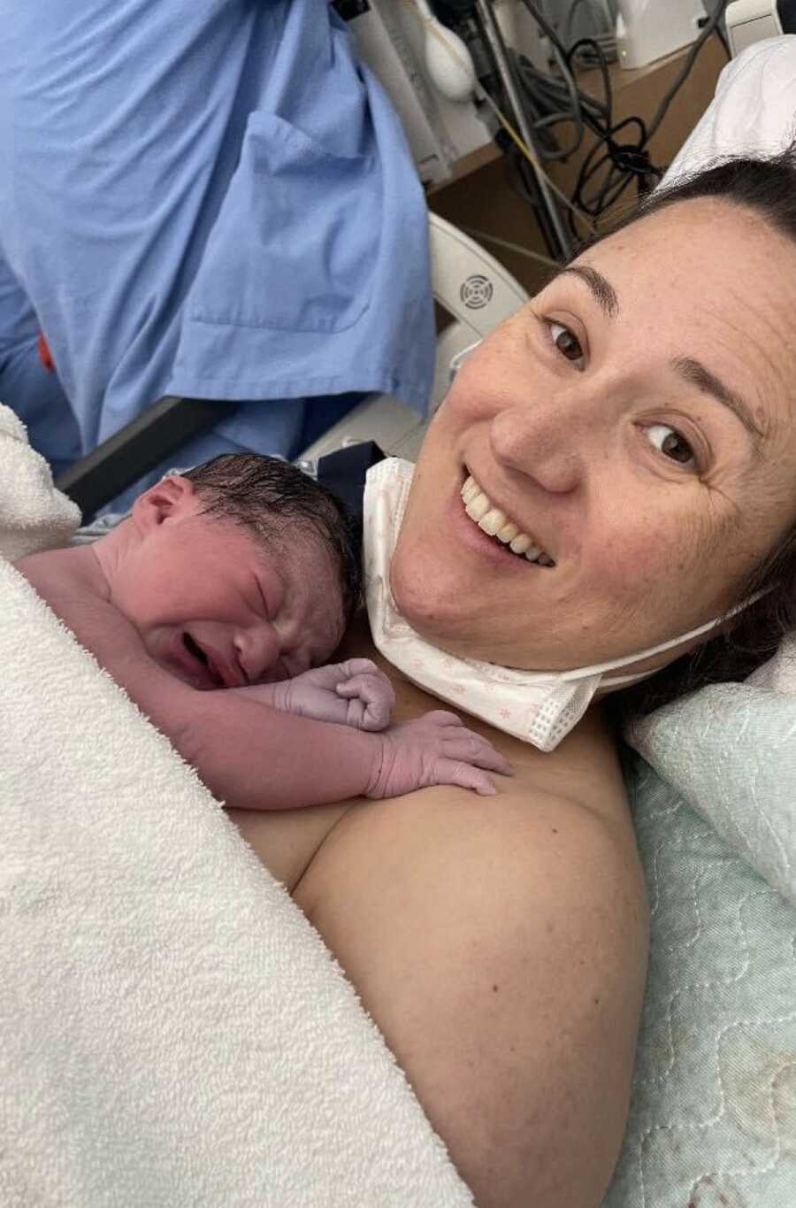 woman with her new born daughter