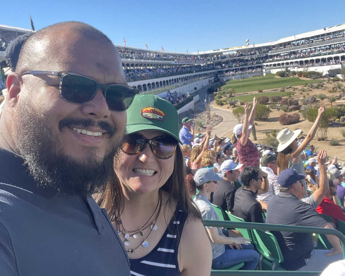 woman with her husband taking a selfie