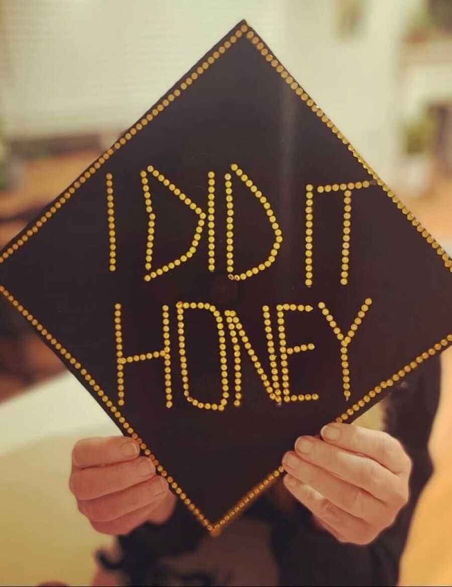 woman's decorated grad cap