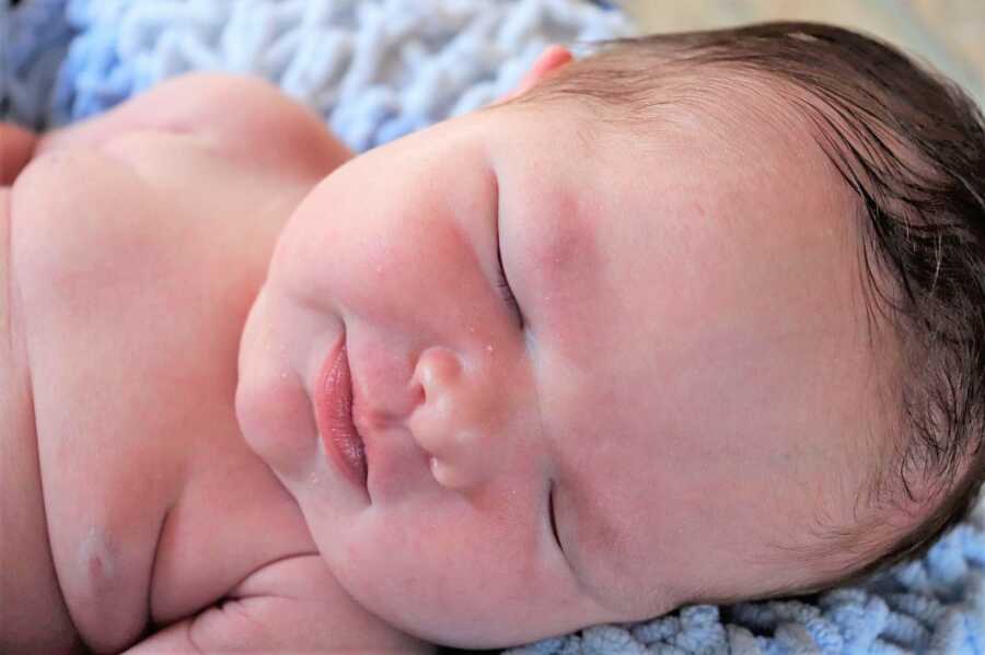closeup of newborn baby sleeping 